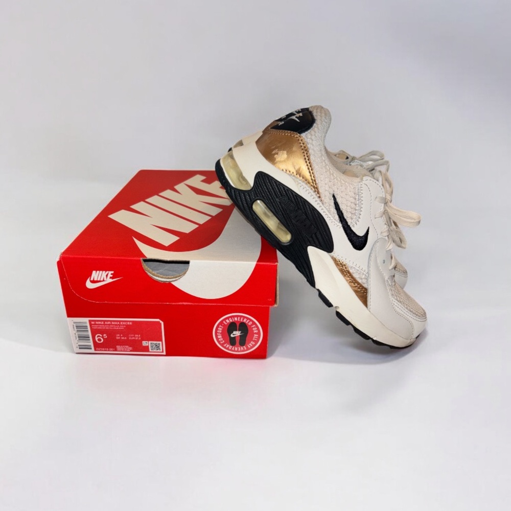 Nike Women’s Sneakers White Black Gold Accent